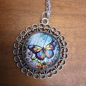 Butterfly Pendant In Silver Tone Bezel With 22" Adjustable Chain Necklace.